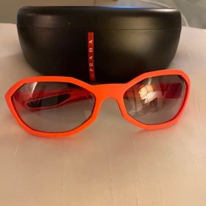 Prada Orange Sunglasses. New, worn only once. Unisex